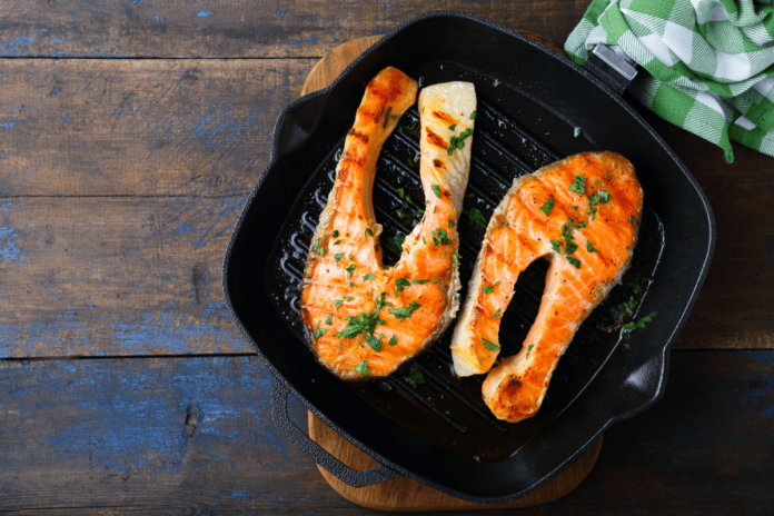 Is a grill pan or a flat pan better for cooking fish?